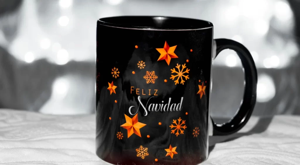 a mug with sublimation printed placed on a table.