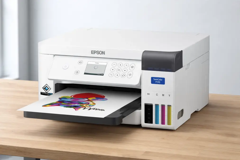 White desktop inkjet printer printing a colorful image on paper